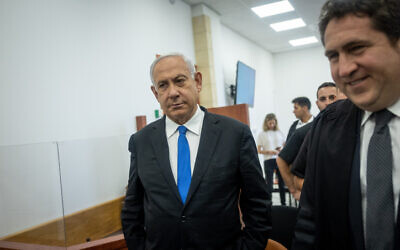 Former prime minister Benjamin Netanyahu arrives for a court hearing in his trial, at the District Court in Jerusalem on May 31, 2022. (Yonatan Sindel/Flash90)