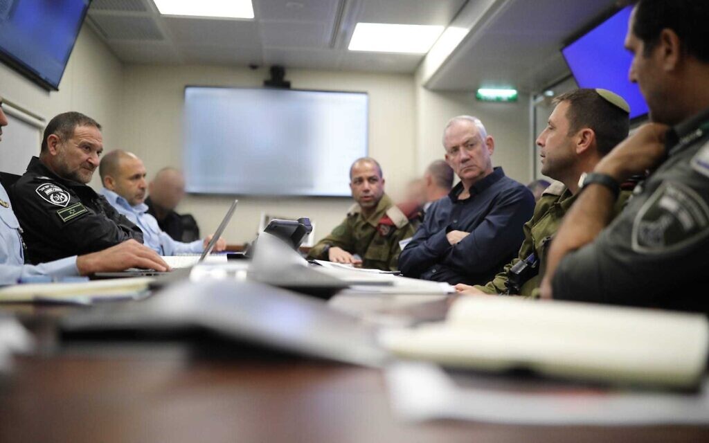 Defense Minister Benny Gantz holds a meeting with military and security officials on May 7, 2022, as a manhunt for the perpetrators of the deadly Elad terror attack continues. (Elad Malka)