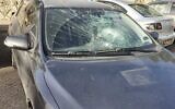 The smashed front window of an Israeli car after a Palestinian allegedly hurled a cinderblock at the vehicle near the West Bank settlement of Beit El, May 13, 2022. (Israel Defense Forces)