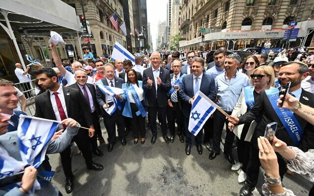 Defense Minister Benny Gantz, Immigration and Absorption Minister Pnina Tamano-Shata, and Diaspora Minister Nachman Shai march in the Celebrate Israel parade in Manhattan on May 22, 2022. (Ariel Hermoni/Defense Ministry)
