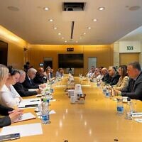 Foreign Minister Yair Lapid (left, center) meets with Meretz MK Ghaida Rinawie Zoabi (second from right) in Jerusalem on May 22, 2022. (Courtesy)