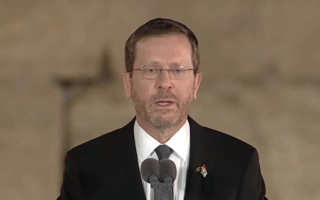 President Isaac Herzog addresses the state ceremony for Israel's Memorial Day for fallen soldiers and terror victims, at Jerusalem's Western Wall, on May 3, 2022. (Screen capture/YouTube)