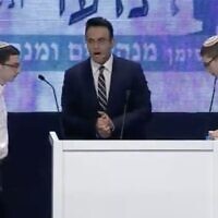 Dvir Merzbach and Hillel Cohen square off in the final round of the annual International Bible Quiz on Israel's Independence Day, on May 5, 2022. (Screen capture: Twitter)
