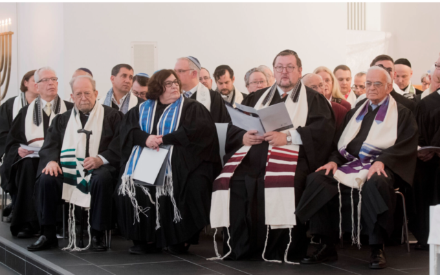 Rabbi Walter Homolka, second from right, and other liberal and Reform rabbis in the liberal Jewish community's synagogue in Hanover, Germany, Dec. 1, 2016. (Julian Stratenschulte/picture alliance via Getty Images via JTA)