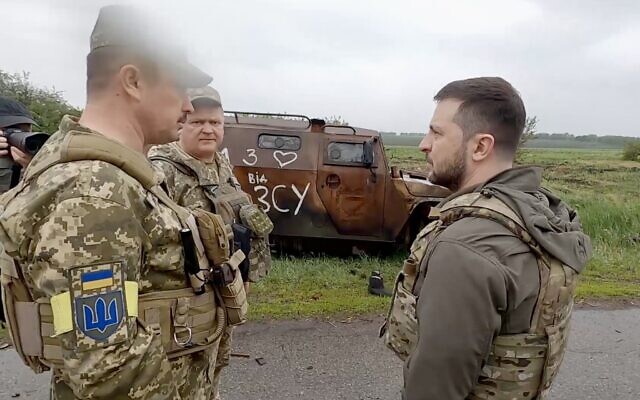 Ukrainian President Volodymyr Zelensky meets with troops in eastern Ukraine on May 29, 2022, amid Russia's invasion of the country. (Screen capture: Facebook)