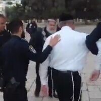 Screen capture from video of man Jewish man detained by police for bowing down on the Temple Mount in Jerusalem, May 23, 2022. (Twitter)