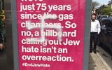A swastika on an antisemitism awareness billboard in New York City, May 5, 2022. (Courtesy/JewBelong)