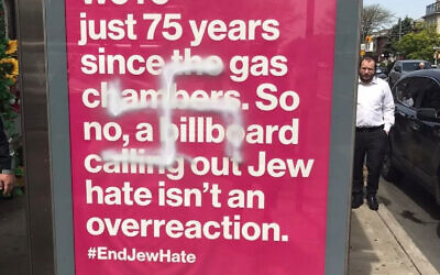 A swastika on an antisemitism awareness billboard in New York City, May 5, 2022. (Courtesy/JewBelong)