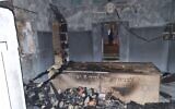 Damage is seen to a shrine, believed by some to be the burial place of the biblical Benjamin son of Jacob, following a fire near the city of Kfar Saba, on May 6, 2022. (Israel Police)