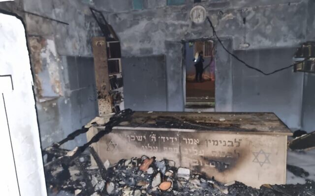 Damage is seen to a shrine, believed by some to be the burial place of the biblical Benjamin son of Jacob, following a fire near the city of Kfar Saba, on May 6, 2022. (Israel Police)