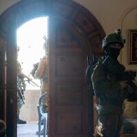 Israeli troops are seen operating in the home of a Palestinian terrorist in the West Bank town of Rummanah, May 8, 2022. (Israel Defense Forces)
