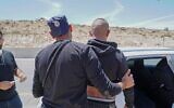 Police detain a Palestinian who entered Israeli illegally, May 2022. (Israel Police)