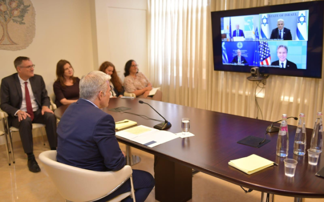 Foreign Minister Yair Lapid meets virtually with his counterparts from the US, Greece and Cyprus in the '3+1' forum, May 9, 2022. (Natan Weil/GPO)