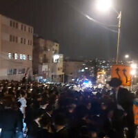 Dozens of ultra-Orthodox Jews protest in Jerusalem, May 21, 2022. (Screenshot: Twitter)