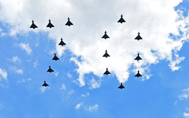 Fighter jets from Britain's RAF (Royal Air Force) fly in formation to form the number '70' during a special flypast from Buckingham Palace balcony following the Queen's Birthday Parade, the Trooping the Color, as part of Queen Elizabeth II's platinum jubilee celebrations, in London on June 2, 2022. (Paul Ellis/Pool/AFP)