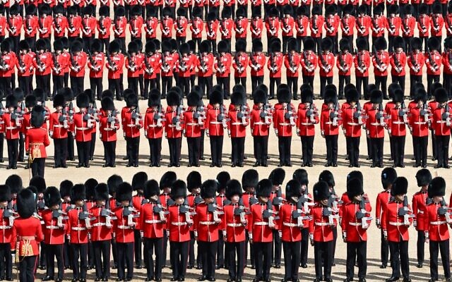 Members of the Household Division Foot Guards take part in the Queen's Birthday Parade, the Trooping the Color, as part of Queen Elizabeth II's Platinum Jubilee celebrations, on Horseguards Parade in London on June 2, 2022. (Jeff Mitchell/Various sources/AFP)