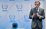 Rafael Grossi, director general of the International Atomic Energy Agency (IAEA), updates journalists about the current situation in Iran as he stands next to an example of a monitoring camera, at the agency's headquarters in Vienna, Austria on June 9, 2022. (JOE KLAMAR / AFP)