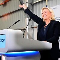 French far-right party Rassemblement National (RN) leader Marine Le Pen delivers a speech after the first results of the parliamentary elections in Henin-Beaumont, northern France, on June 19, 2022. (Photo by DENIS CHARLET / AFP)