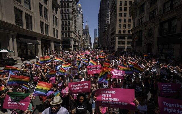 Participants march during the 2022 New York Pride Parade in New York City on June 26, 2022. (Ed JONES / AFP)