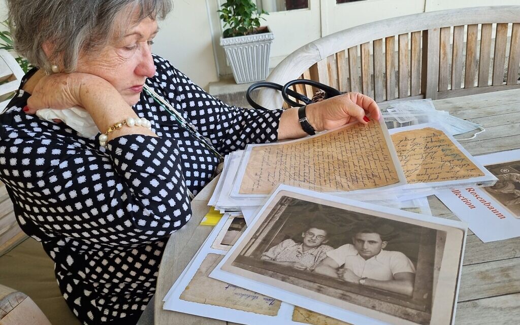 Group member Dr. Hanna Rosenbaum-Erichman with letters and photos of her parents as DPs, May 2022. (Bernard Dichek)