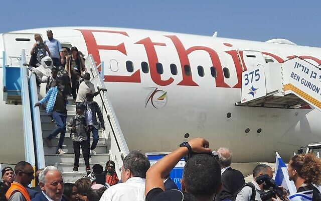 Immigrants from Ethiopia arrive at Ben Gurion Airport in Israel on June 1, 2022. (Amy Spiro/ The Times of Israel)