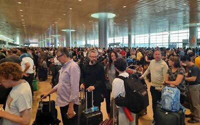 Lines for check-in at Ben Gurion Airport, June 26, 2022. (Amy Spiro/Times of Israel)