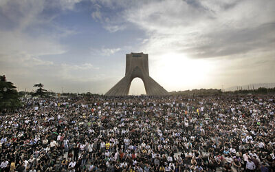 In this June 15, 2009 file photo, hundreds of thousands of supporters of leading opposition presidential candidate Mir Hossein Mousavi, who claims there was voting fraud in Friday's election, turn out to protest the result of the election at a mass rally in Azadi (Freedom) square in Tehran, Iran. (AP Photo/Ben Curtis, File)