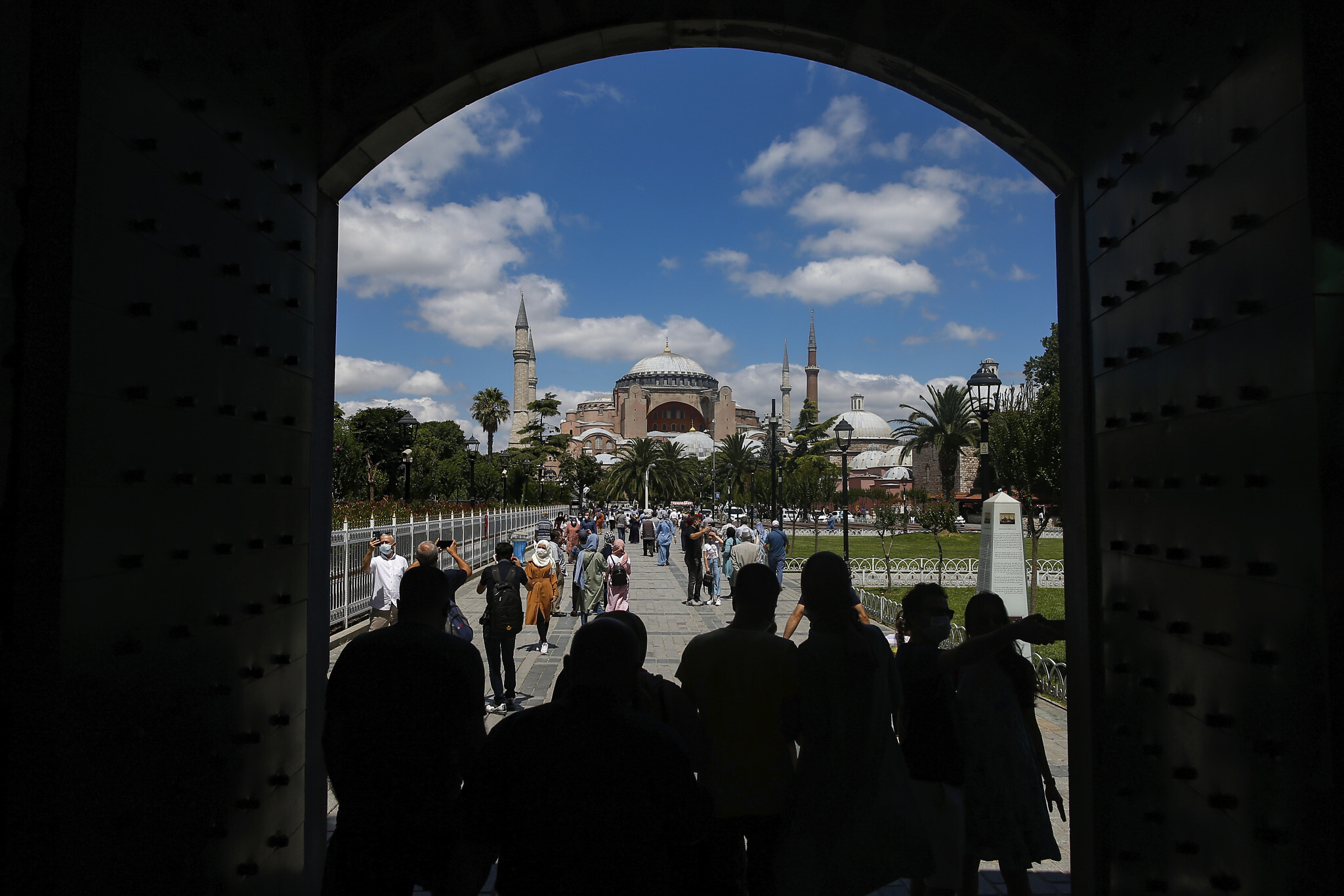 People walk towards the Byzantine-era Hagia Sophia, one of Istanbul’s main tourist attractions in the historic Sultanahmet district of Istanbul, Saturday, July 11, 2020. (AP/Emrah Gurel)