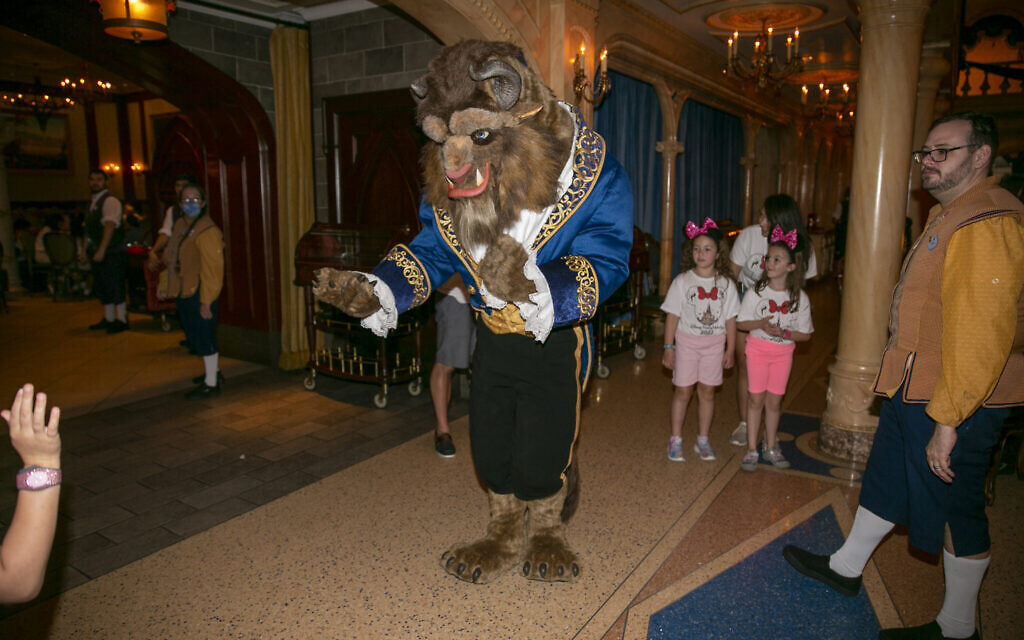 Illustrative: A performer dressed as the Beast from Beauty and the Beast greets diners at a restaurant at Walt Disney World Resort in Lake Buena Vista, Florida, April 18, 2022. (AP Photo/Ted Shaffrey)