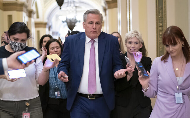 ouse Minority Leader Kevin McCarthy, R-Calif., heads to his office surrounded by reporters after House investigators issued a subpoena to McCarthy and four other GOP lawmakers as part of their probe into the violent Jan. 6 insurrection, at the Capitol in Washington, May 12, 2022. (J. Scott Applewhite/AP)