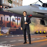 Tom Cruise poses for the media during the 'Top Gun Maverick' UK premiere at a central London cinema, on May 19, 2022. (Alberto Pezzali/AP)