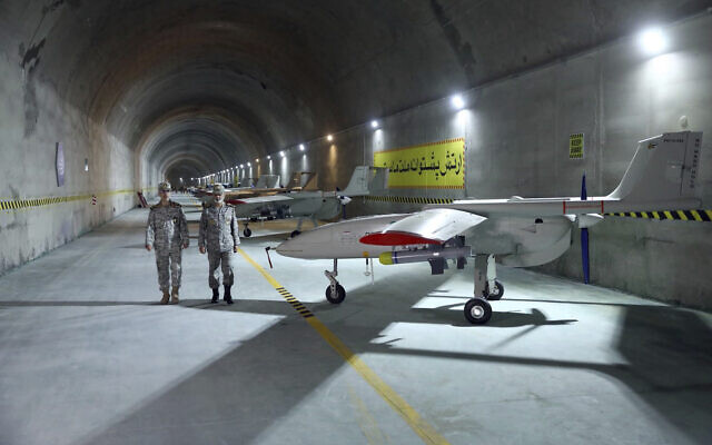Illustrative: Chief of the General Staff of the Armed Forces Gen. Mohammad Hossein Bagheri, left, and Commander of the Army Gen. Abdolrahim Mousavi visit an underground drone base tunnel of the Army in the heart of the country's western Zagros Mountains, Saturday, May 28, 2022. (Iranian Army via AP)
