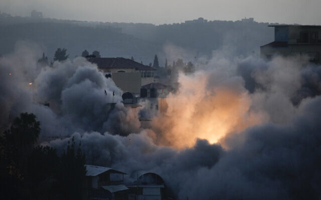 Israeli troops blow up the house of Bnei Brak terrorist Diaa Hamarsheh in the West Bank village of Ya'bad, June 2, 2022 (AP Photo/Majdi Mohammed)