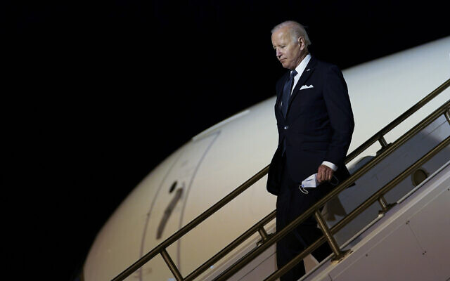 US President Joe Biden walks down the steps of Air Force One at Dover Air Force Base, Delaware, June 2, 2022, as he heads to Rehoboth Beach, Delaware, for the weekend. (AP Photo/Susan Walsh)