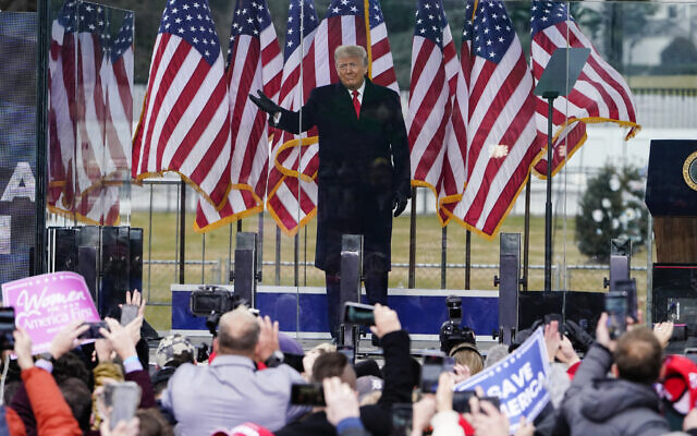 Then-US president Donald Trump arrives to speak during a rally protesting the electoral college certification of Joe Biden as president in Washington, January 6, 2021. (AP Photo/Jacquelyn Martin, File)