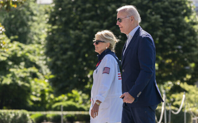 US President Joe Biden and first lady Jill Biden walk on the South Lawn upon arrival at the White House in Washington, June 5, 2022. (Manuel Balce Ceneta/AP)
