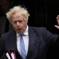 British Prime Minister Boris Johnson leaves 10 Downing Street to attend the weekly Prime Minister's Questions at the Houses of Parliament, in London, May 25, 2022. (AP Photo/Matt Dunham, File)