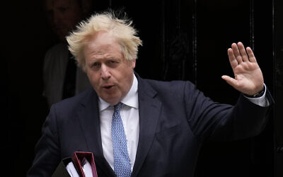 British Prime Minister Boris Johnson leaves 10 Downing Street to attend the weekly Prime Minister's Questions at the Houses of Parliament, in London, May 25, 2022. (AP Photo/Matt Dunham, File)