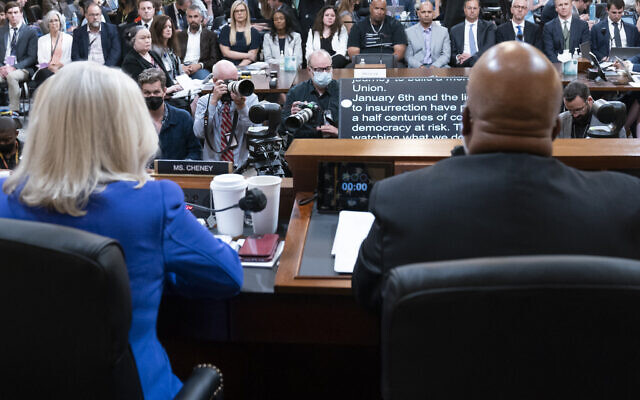 Vice Chair Liz Cheney, R-Wyo., left, listens as Chairman Bennie Thompson, D-Miss., gives an opening statement as the House select committee investigating the Jan. 6 attack on the U.S. Capitol holds its first public hearing to reveal the findings of a year-long investigation, on Capitol Hill in Washington, Thursday, June 9, 2022. (AP Photo/Alex Brandon, Pool)