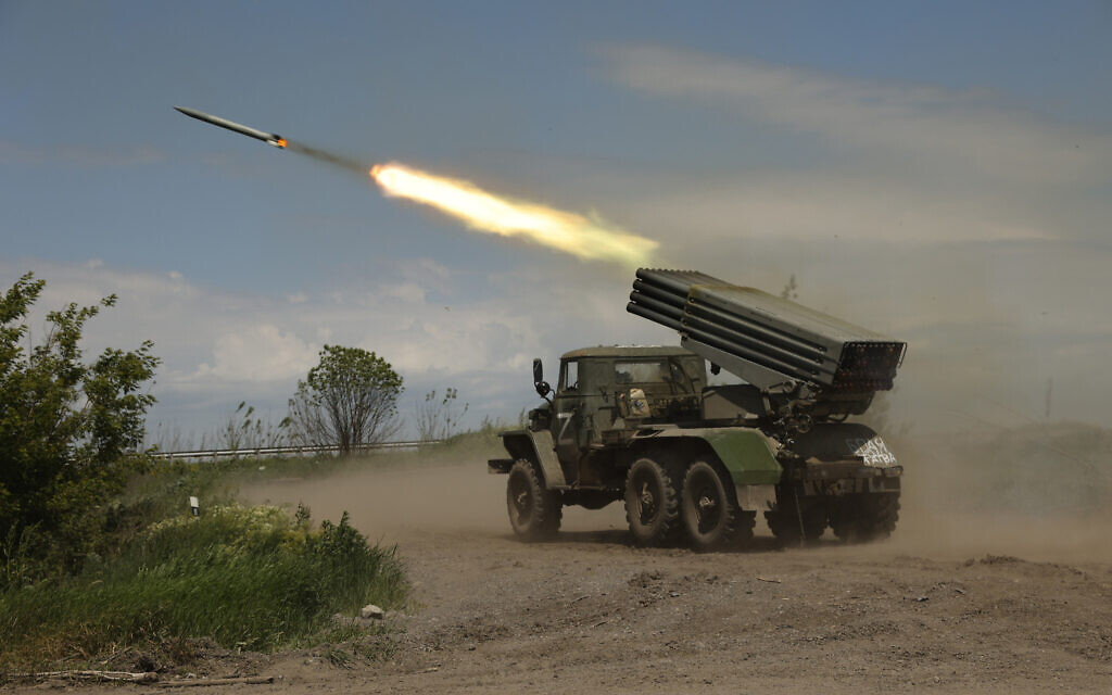 A Donetsk People's Republic militia's multiple rocket launcher fires from its position not far from Panteleimonivka, in territory under the government of the Donetsk People's Republic, eastern Ukraine, May 28, 2022. (Alexei Alexandrov/AP)