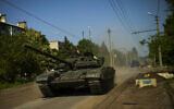Ukrainian tanks move in Donetsk region, eastern Ukraine, May 30, 2022. (Francisco Seco/AP)