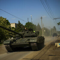 Ukrainian tanks move in Donetsk region, eastern Ukraine, May 30, 2022. (Francisco Seco/AP)