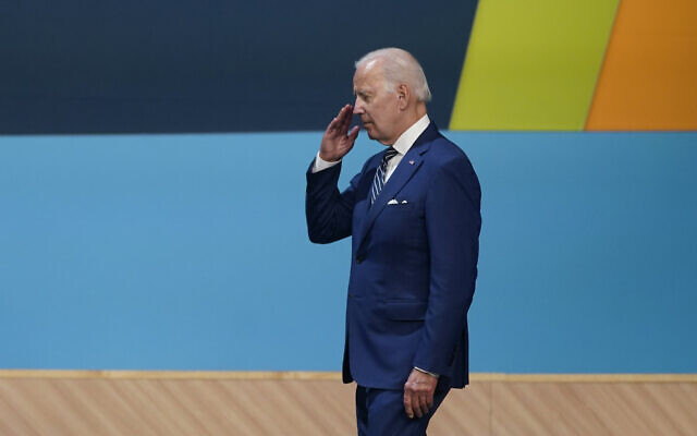 US President Joe Biden walks to his place during a family photo with heads of delegations at the Summit of the Americas, Friday, June 10, 2022, in Los Angeles. (AP Photo/Evan Vucci)
