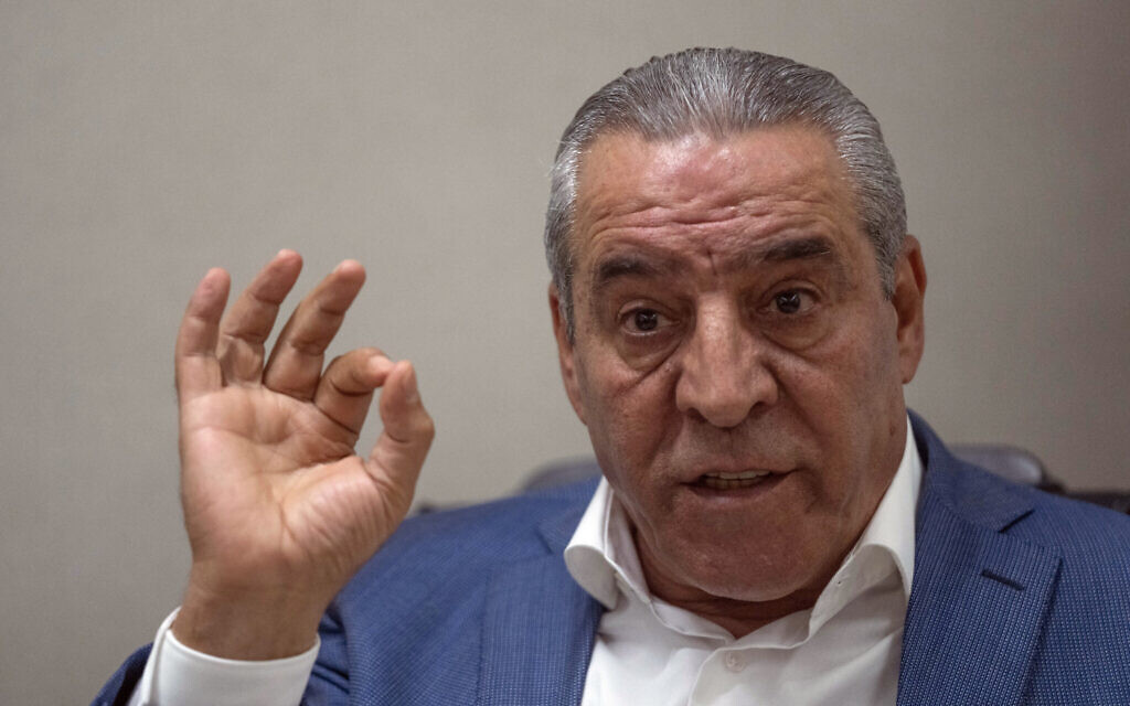 Newly appointed secretary general of the Executive Committee of the PLO Hussein al-Sheikh gives an interview to The Associated Press at his office Ramallah, June 13, 2022. (AP Photo/Nasser Nasser)