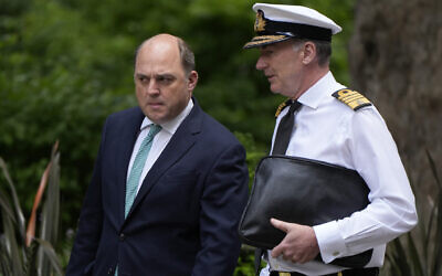 Britain's Defence Secretary Ben Wallace, left, with the Chief of the Defence Staff Admiral Anthony Radakin, walks to a meeting at 10 Downing Street in London, Monday, June 13, 2022. (AP/Alastair Grant)