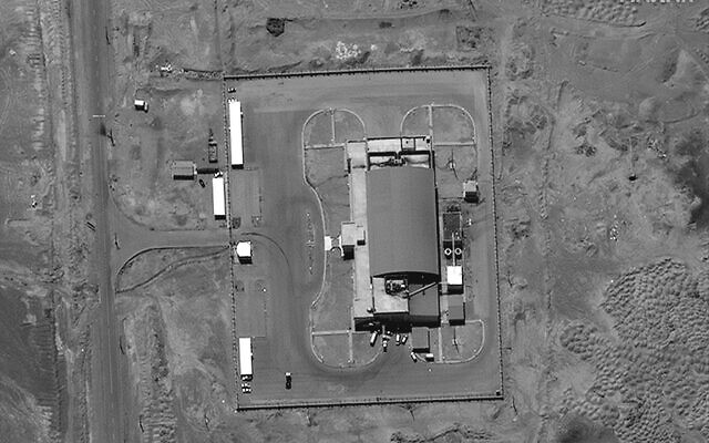 This satellite image from Maxar Technologies shows vehicles at the checkout building at Imam Khomeini Space Center southeast of Semnan, Iran on Tuesday, June 14, 2022. (Satellite image ©2022 Maxar Technologies via AP)