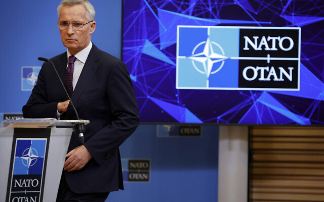 NATO Secretary General Jens Stoltenberg arrives for a media conference at NATO headquarters in Brussels, June 15, 2022. (AP Photo/Olivier Matthys)