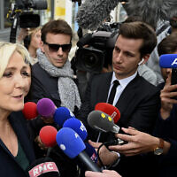 French far-right leader Marine Le Pen addresses reporters June 20, 2022, in Henin-Beaumont, northern France. (AP Photo)