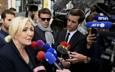 French far-right leader Marine Le Pen addresses reporters June 20, 2022, in Henin-Beaumont, northern France. (AP Photo)