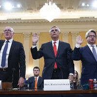 Rusty Bowers, Arizona state House Speaker, from left, Brad Raffensperger, Georgia Secretary of State, and Gabe Sterling, Georgia Deputy Secretary of State, are sworn in to testify as the House select committee investigating the January 6 attack on the US Capitol continues to reveal its findings of a year-long investigation, at the Capitol in Washington, June 21, 2022. (AP Photo/Jacquelyn Martin)